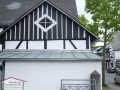 Schleppdach eindeckt in Zinkstehfalztechnik