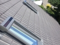 Dachfenstereinbau - Außenrollade mit Solarzelle